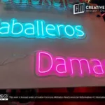 ‘Caballeros Damas’ LED Neon Sign